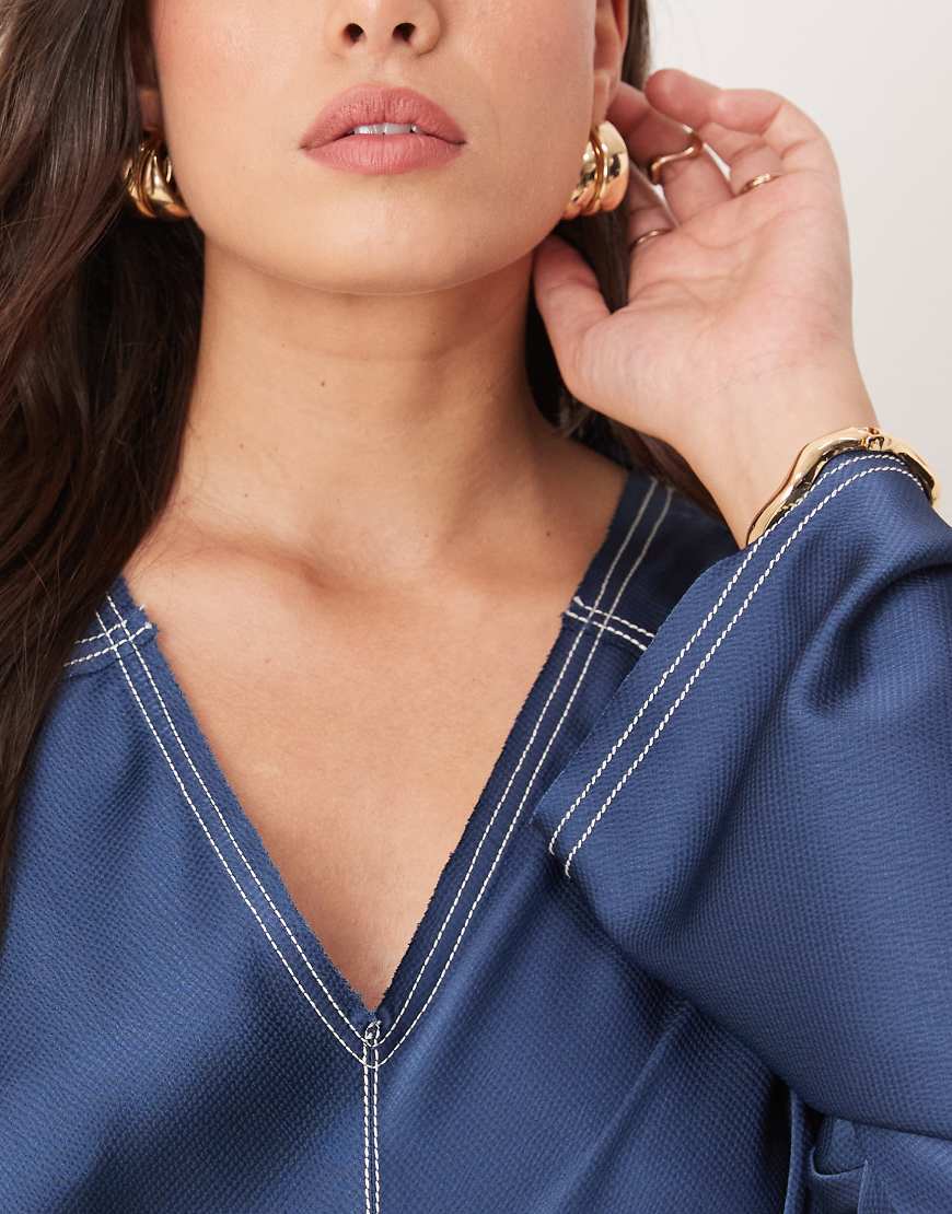 ASOS DESIGN Curve v-neck satin midi dress in denim blue with contrast cream top stitch