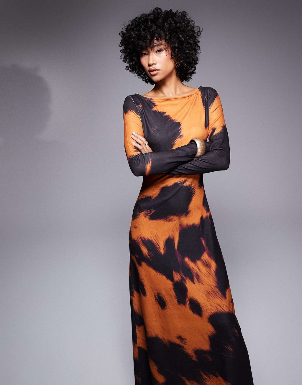 ASOS DESIGN long sleeve midi dress in orange cow print