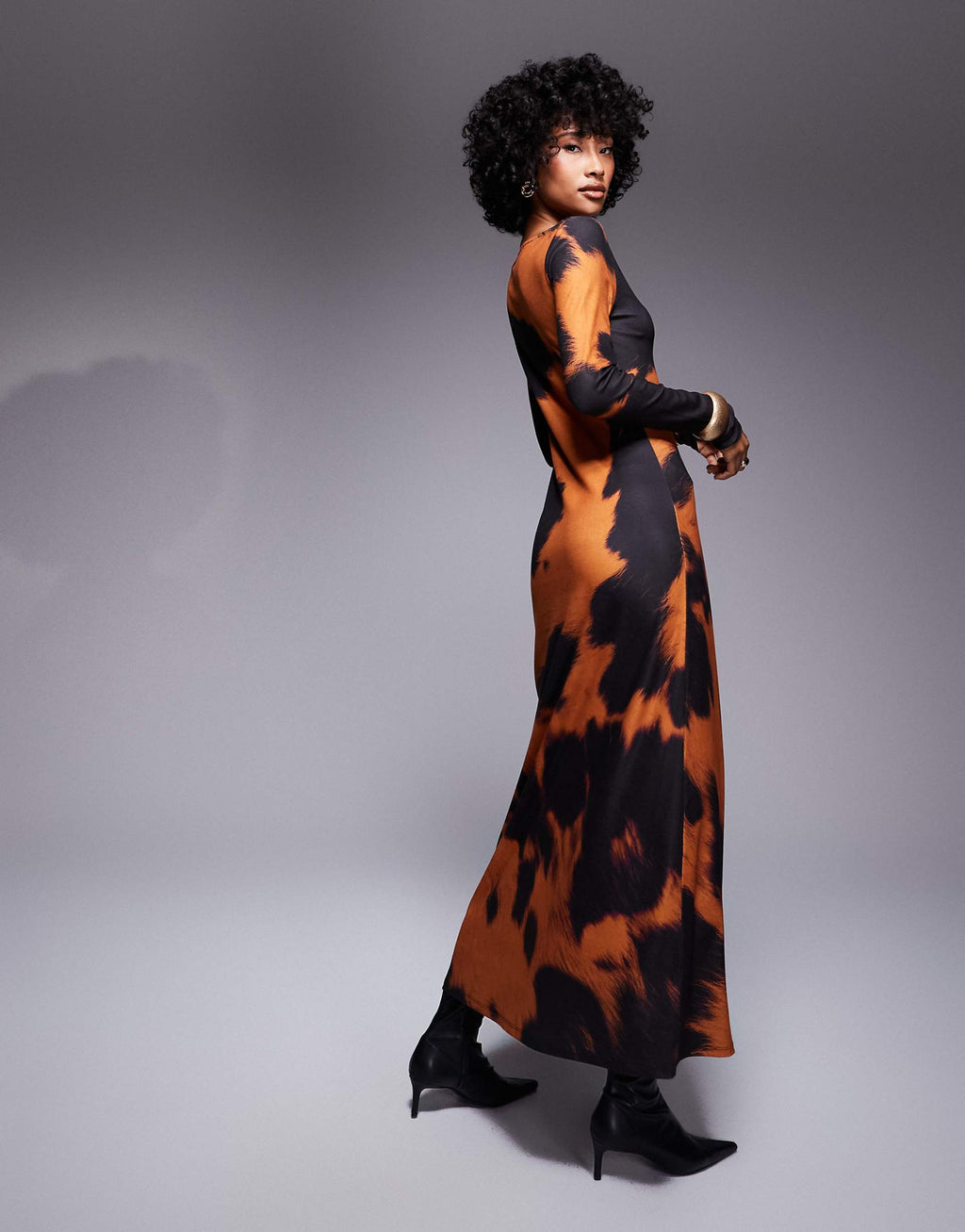 ASOS DESIGN long sleeve midi dress in orange cow print