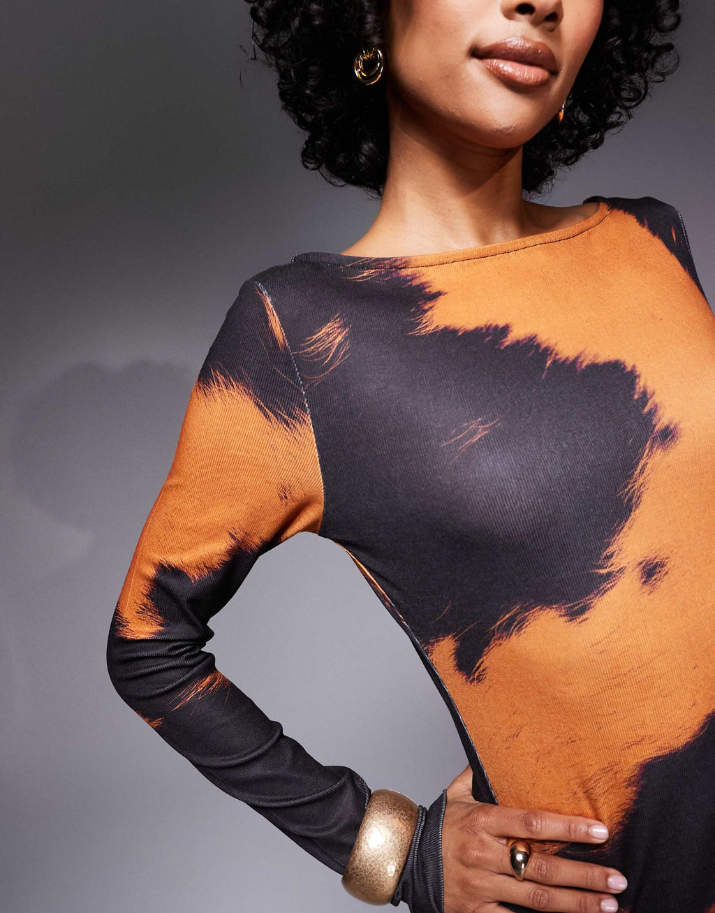 ASOS DESIGN long sleeve midi dress in orange cow print