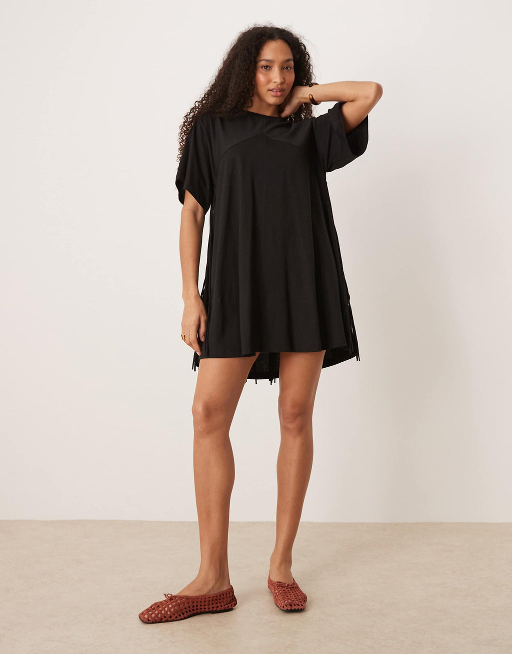 ASOS DESIGN t-shirt swing dress with fringe back detail in black