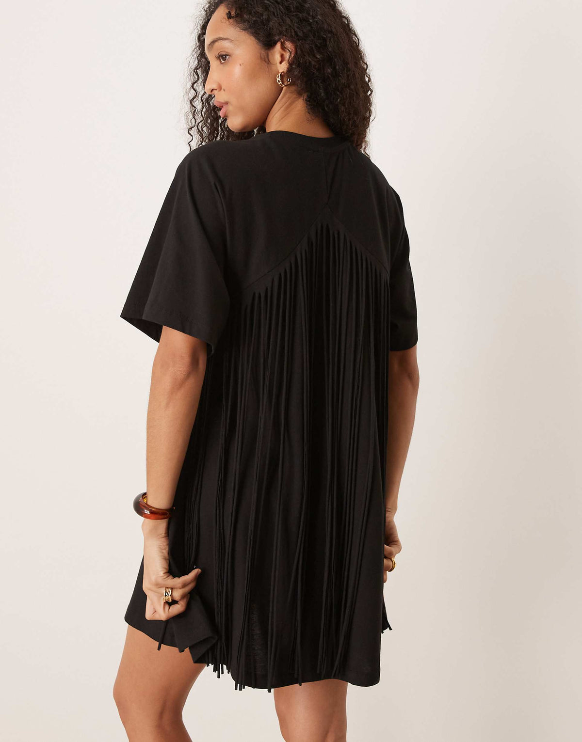 ASOS DESIGN t-shirt swing dress with fringe back detail in black