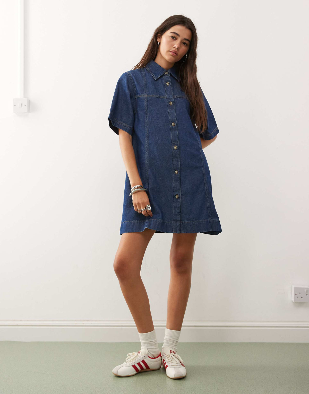 Reclaimed Vintage denim mini shirt dress in mid blue wash with tobacco stitch
