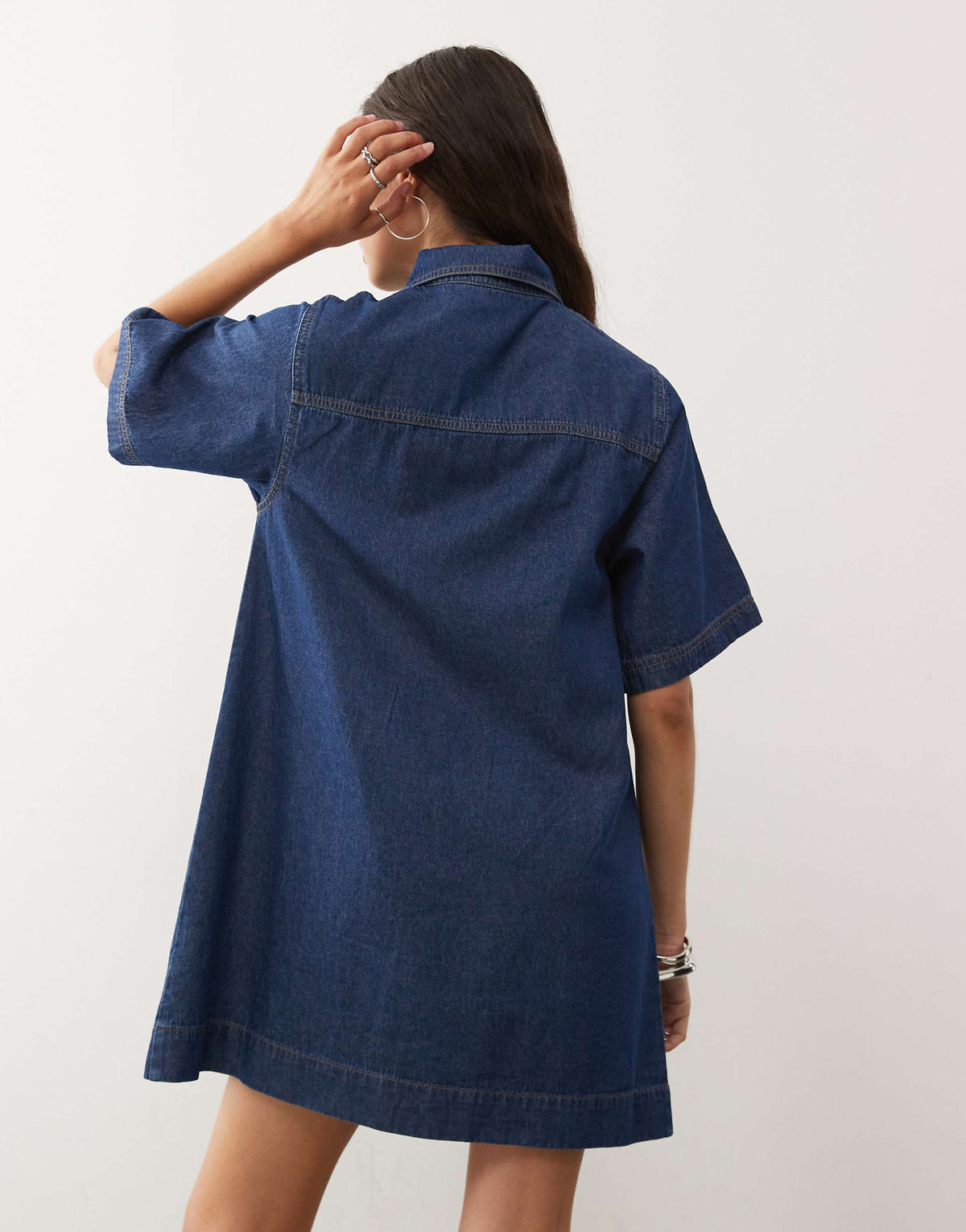 Reclaimed Vintage denim mini shirt dress in mid blue wash with tobacco stitch