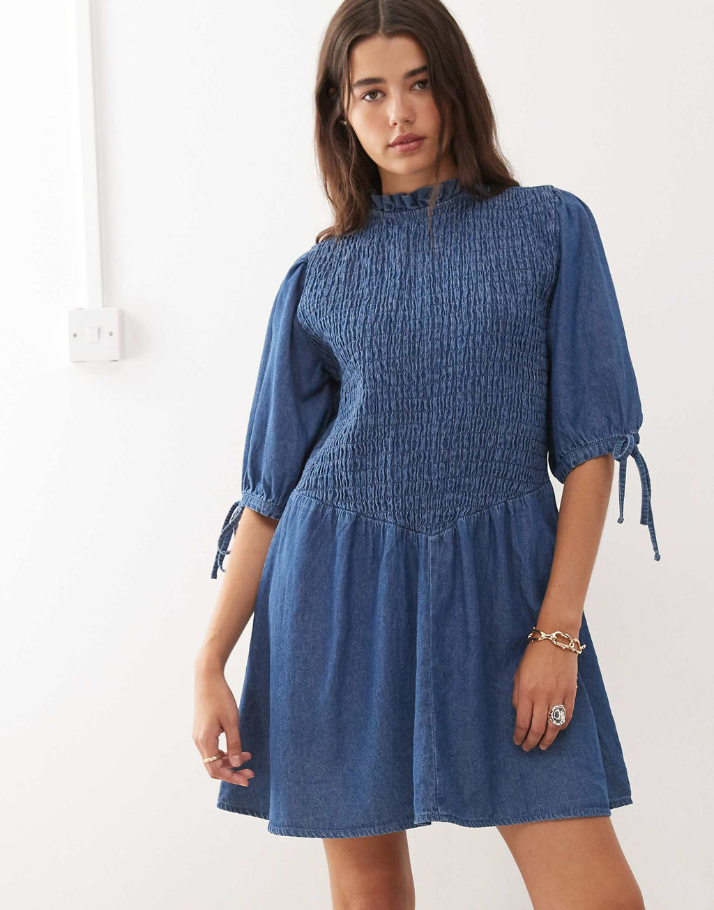 Reclaimed Vintage shirred bodice drop waist mini denim dress in mid blue