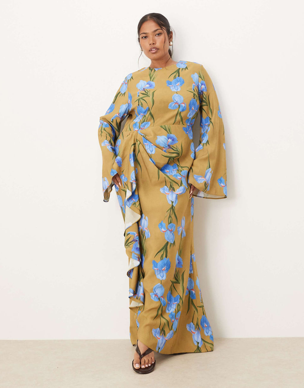 ASOS DESIGN Curve long sleeve maxi dress with ruffle skirt in oversized green floral print