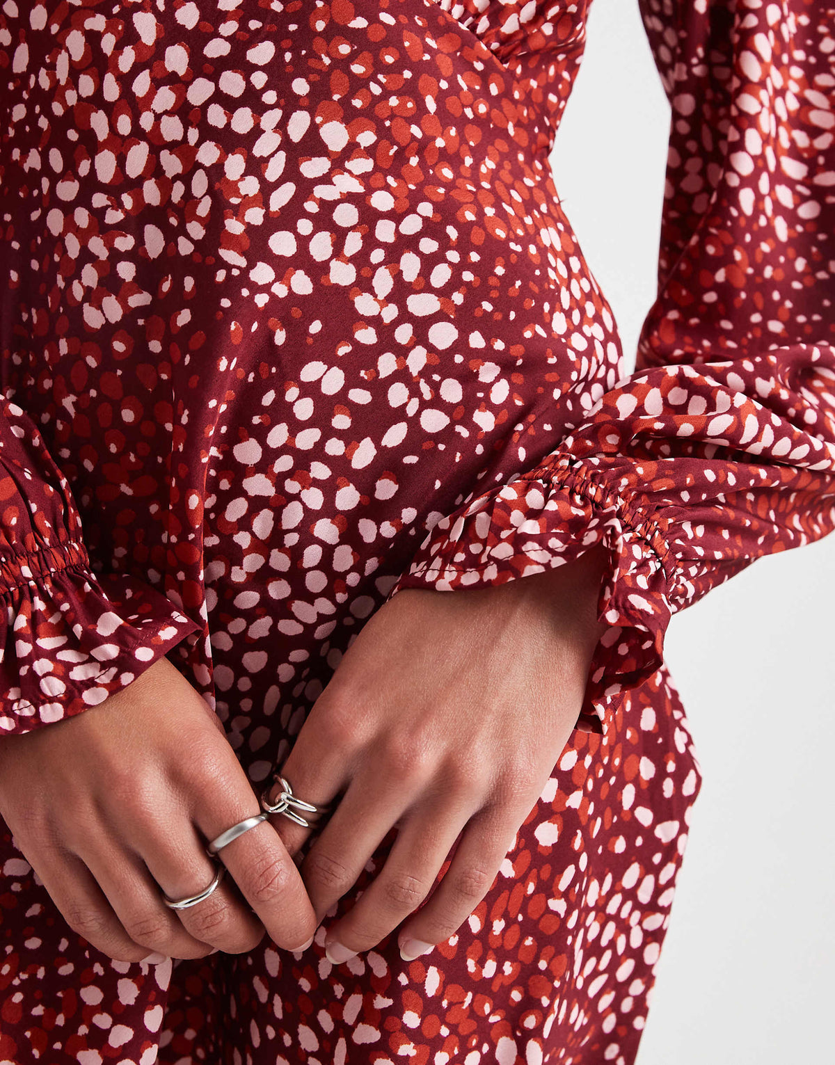 Wednesday's Girl dotty print v-neck mini dress in burgundy and pink