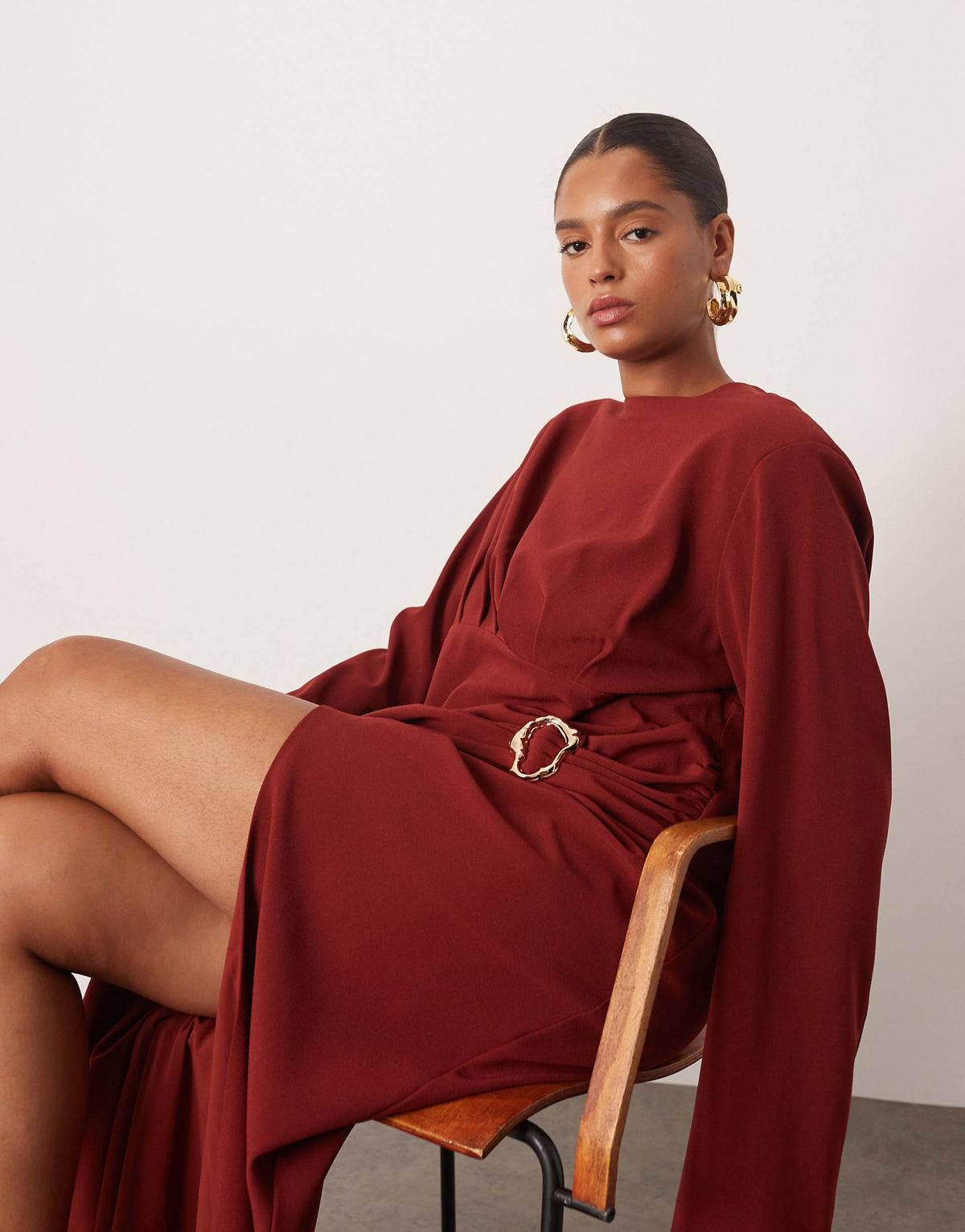 ARRANGE Curve long sleeve draped satin maxi dress with gold hardware in red