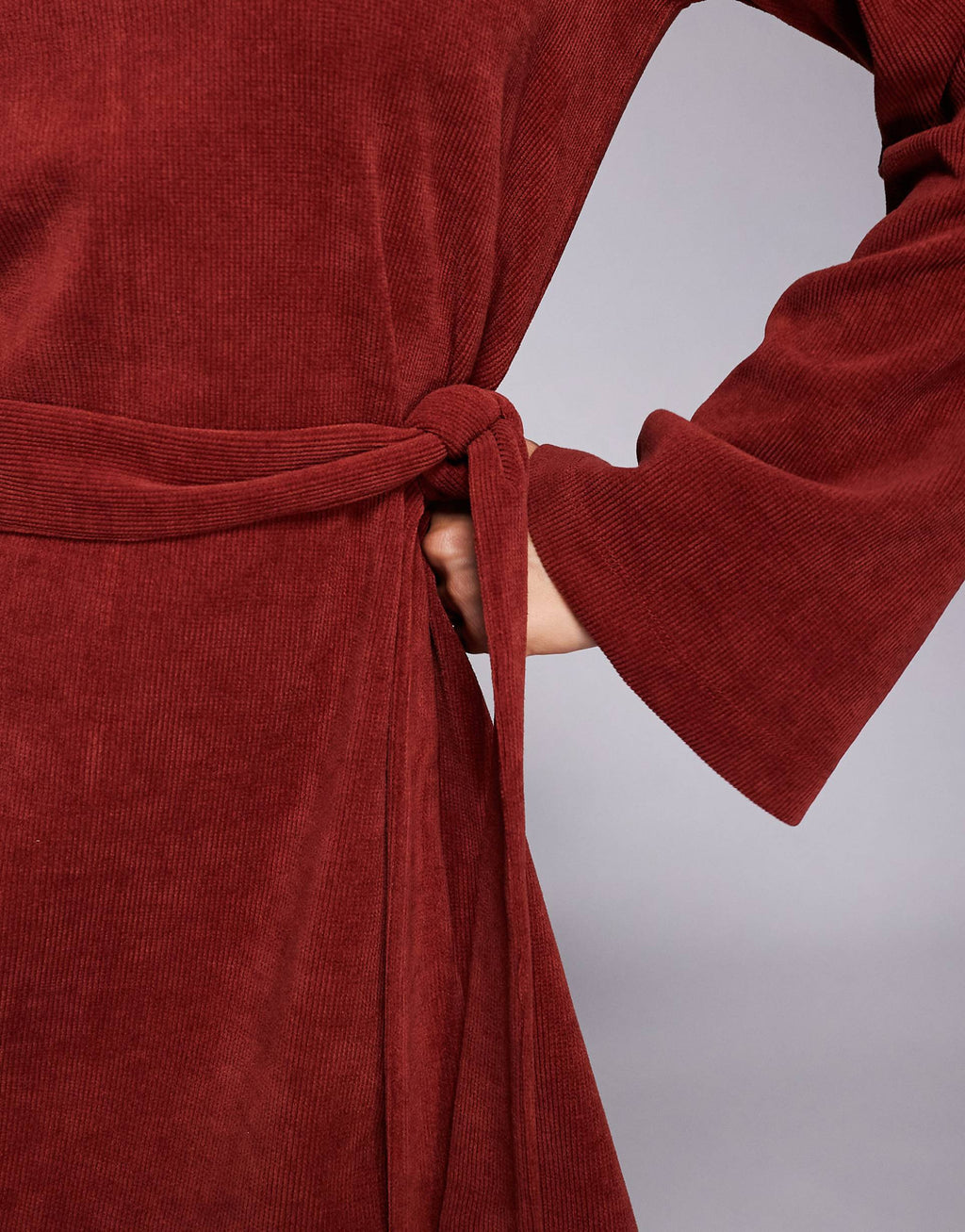 ASOS DESIGN fluted sleeve tie waist corduroy mini dress in burgundy