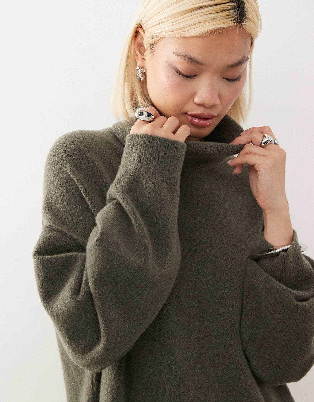 Weekday turtle neck knitted mini sweater dress in khaki melange exclusive to ASOS