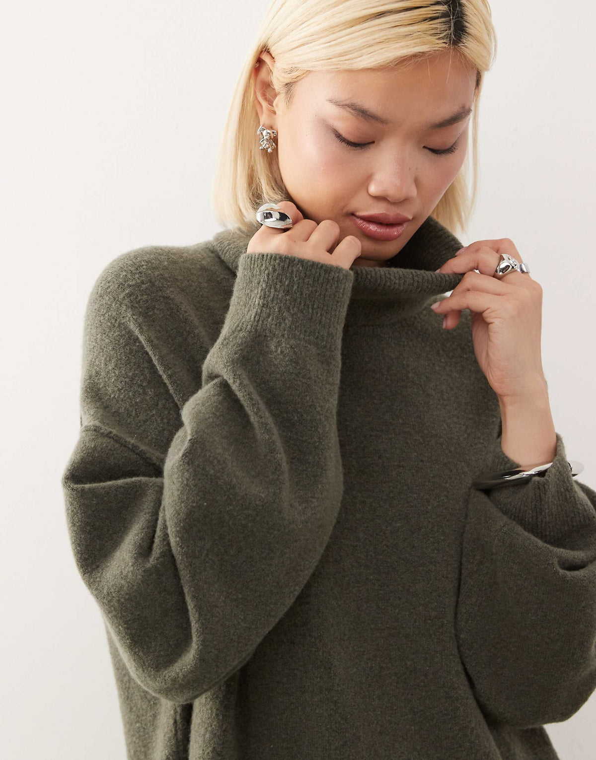 Weekday turtle neck knitted mini sweater dress in khaki melange exclusive to ASOS