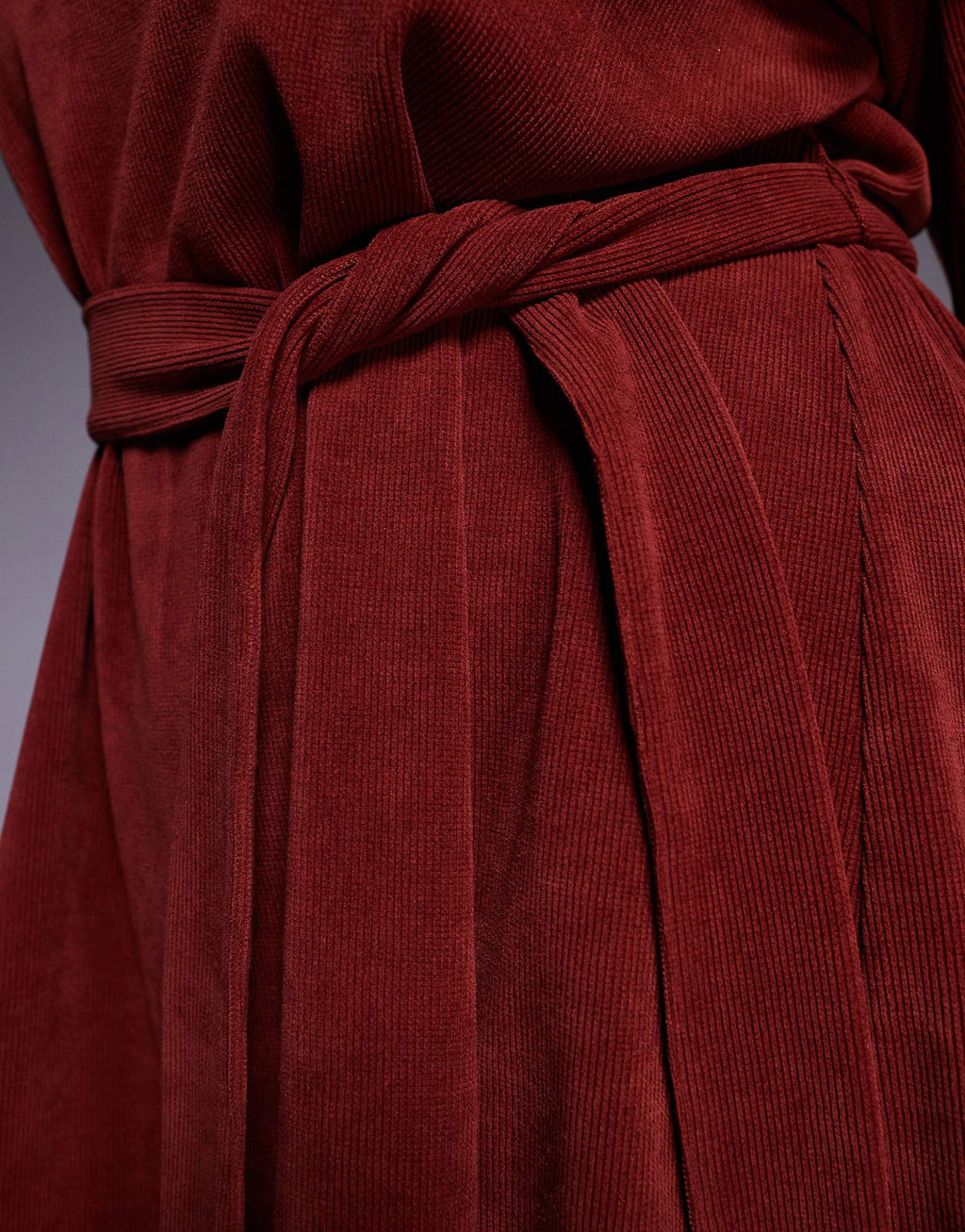 ASOS DESIGN Curve fluted sleeve tie waist corduroy mini dress in burgundy