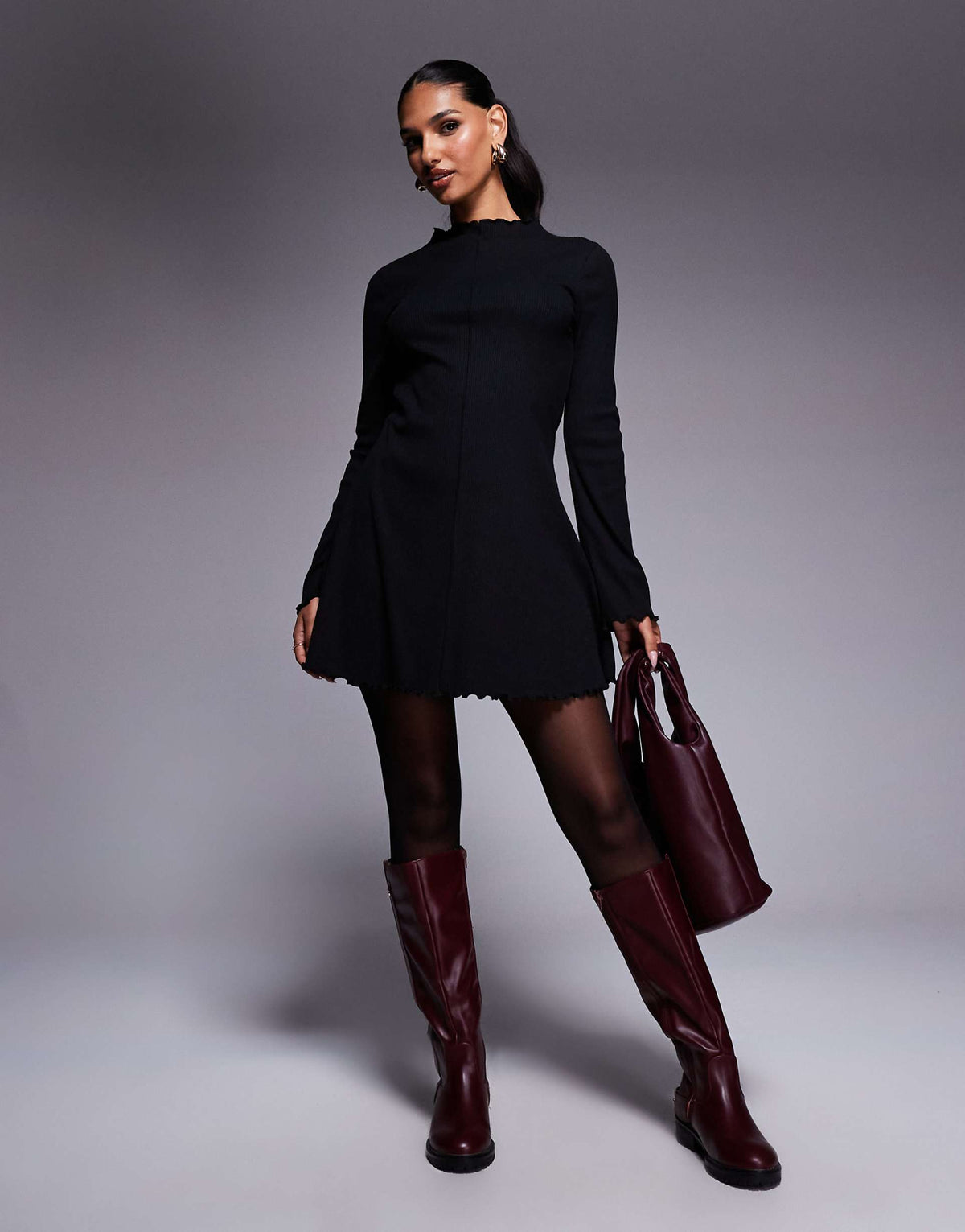 ASOS DESIGN ribbed long sleeve lettuce hem mini dress in black