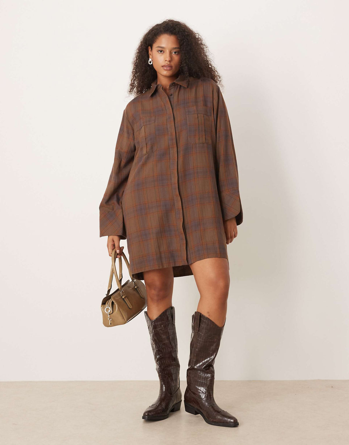 ASOS DESIGN Curve mini shirt dress with wide cuffs and oversized pockets in brown plaid