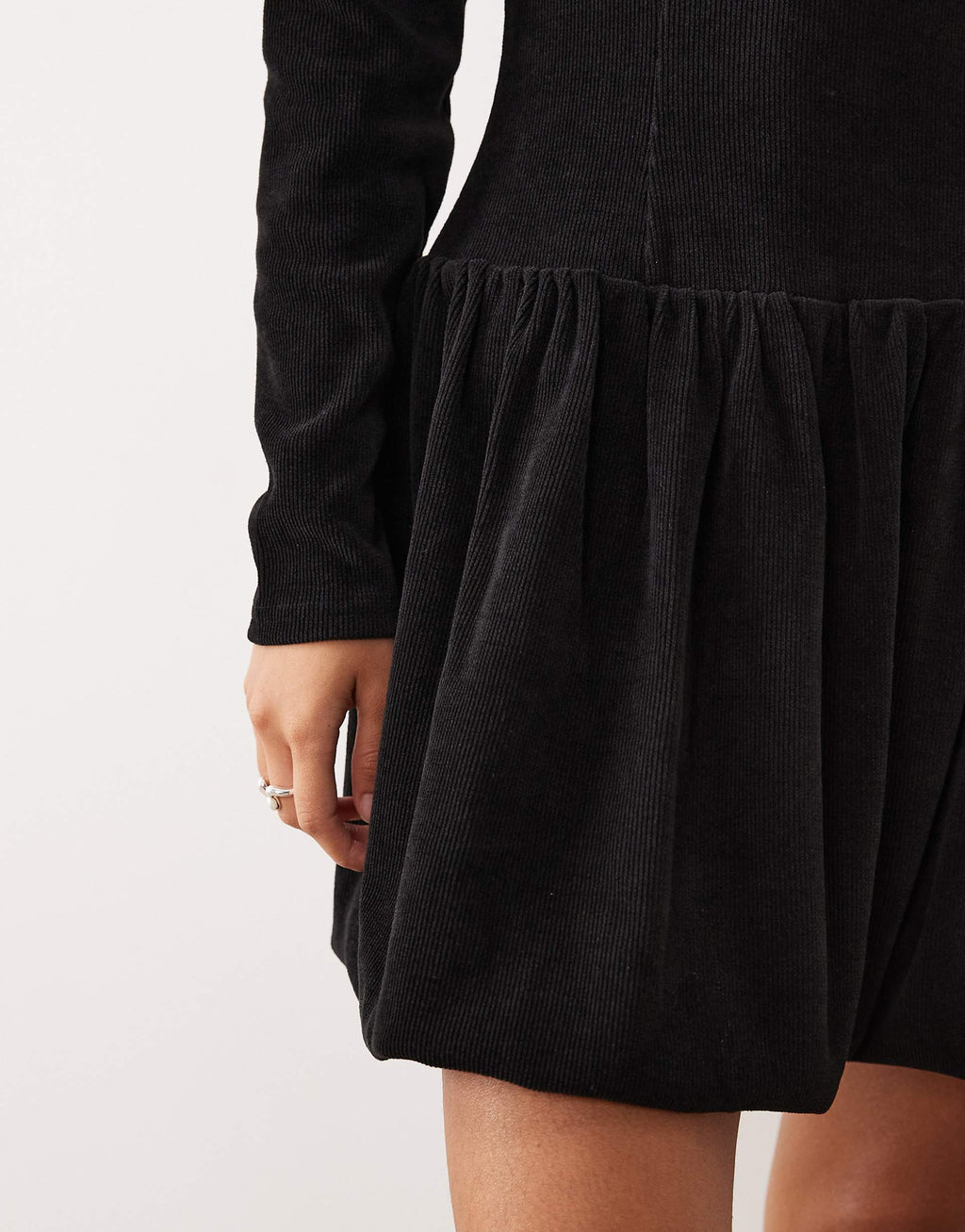 ASOS DESIGN cord dropped waist bubble hem mini dress in black