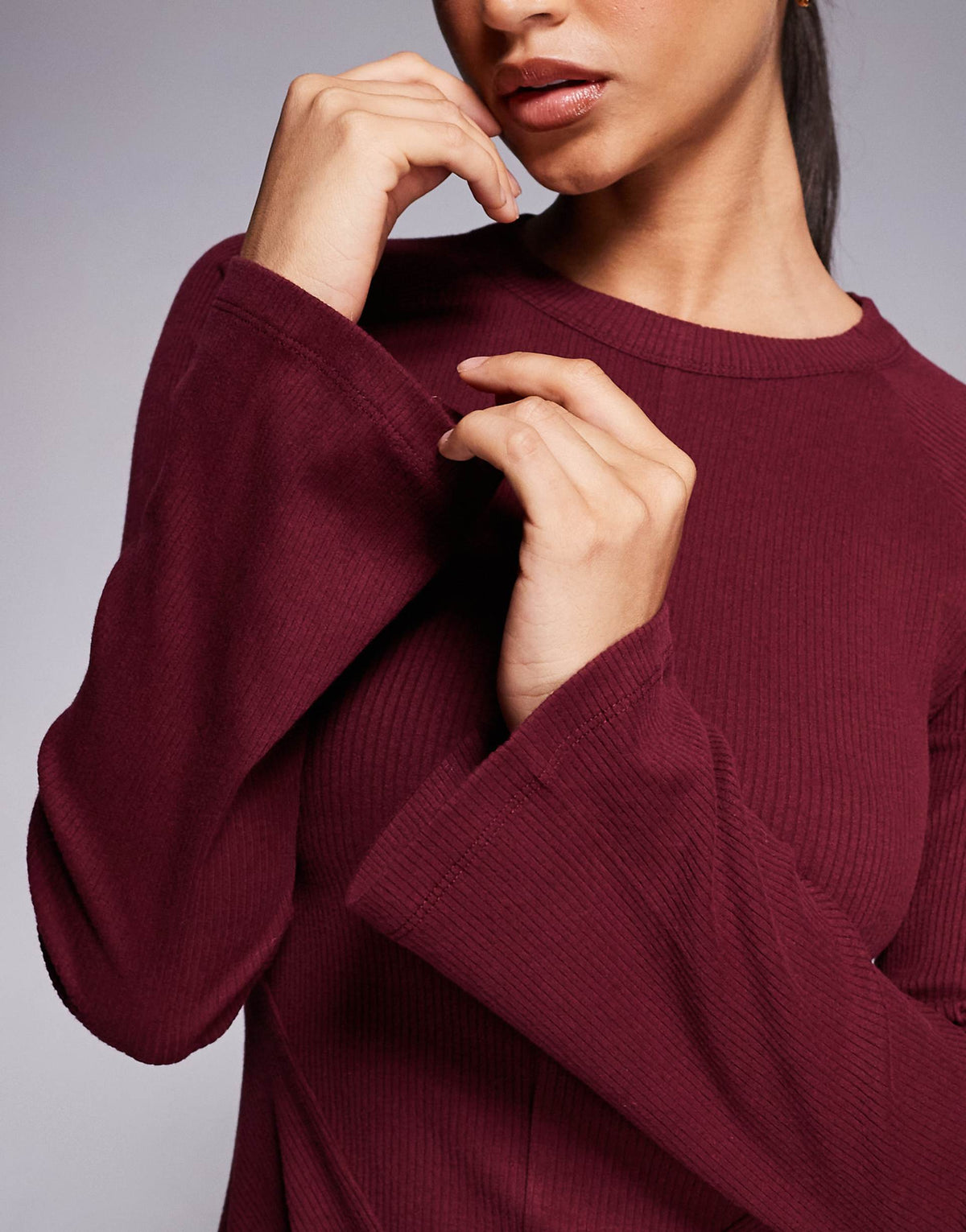 ASOS DESIGN ribbed fluted sleeve skater mini dress with seam details in burgundy