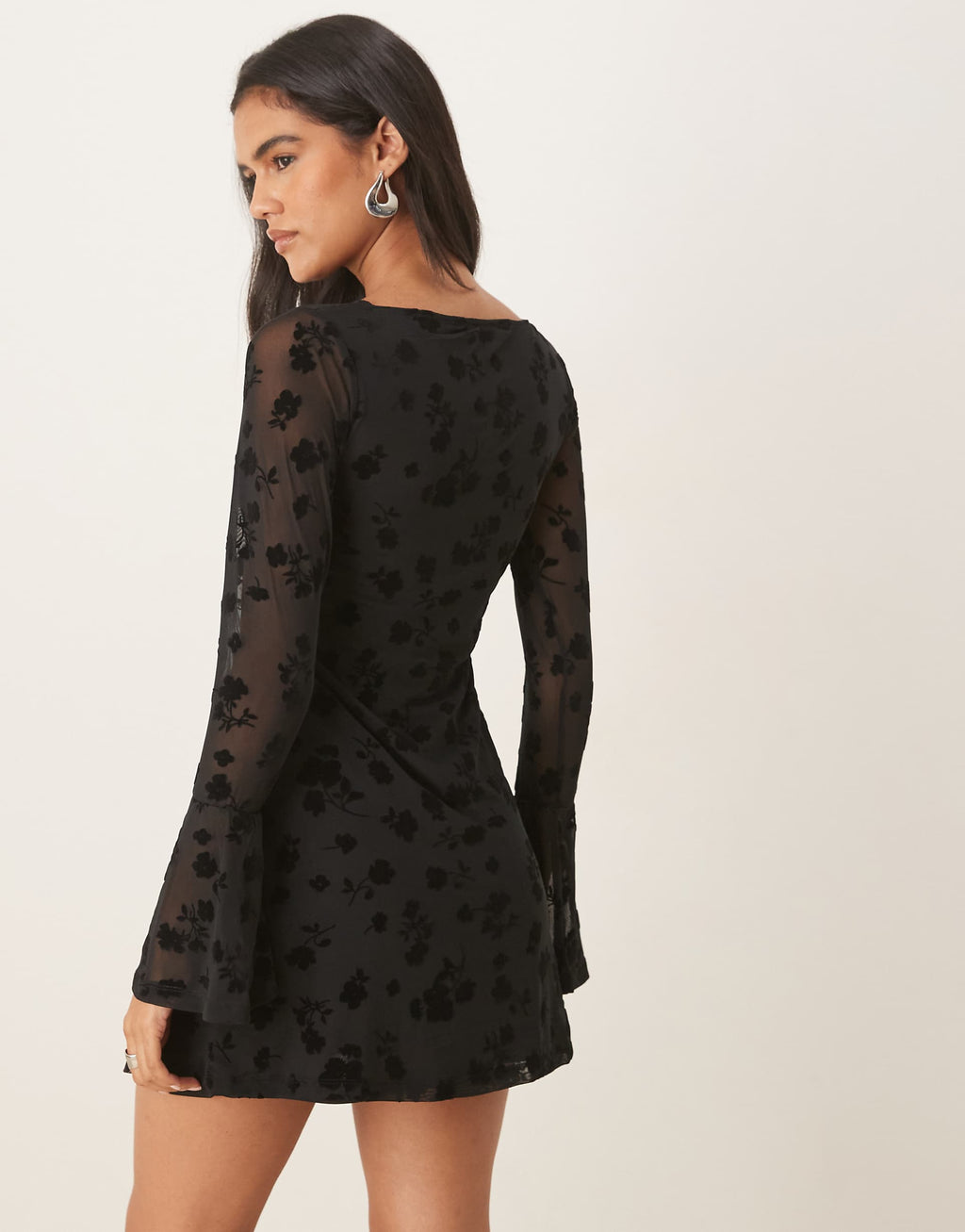 ASOS DESIGN flocked floral mini dress with flute sleeve in black