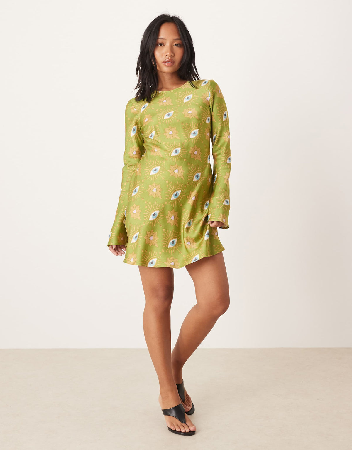 Never Fully Dressed Petite long sleeve mini dress in khaki eye print