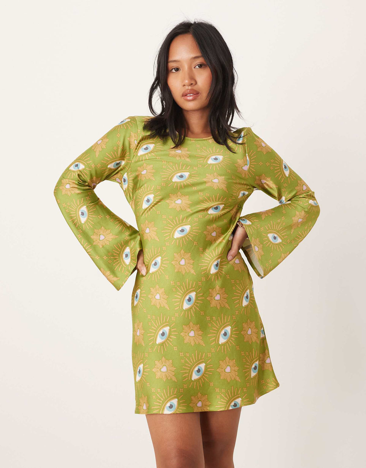 Never Fully Dressed Petite long sleeve mini dress in khaki eye print