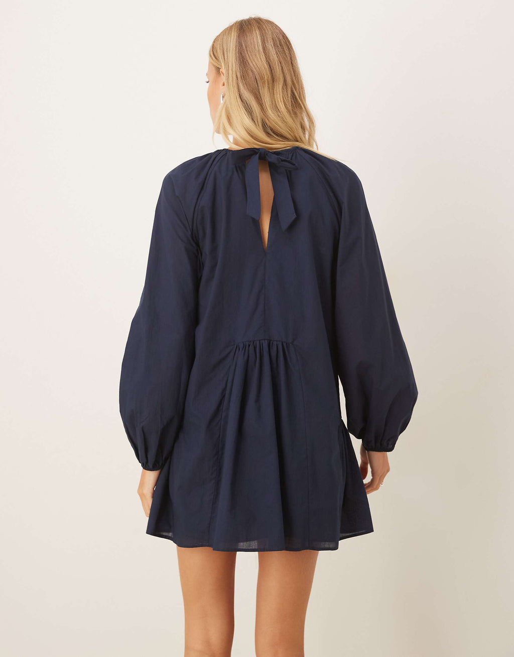 ASOS DESIGN volume smock mini dress with tie back detail in deep navy