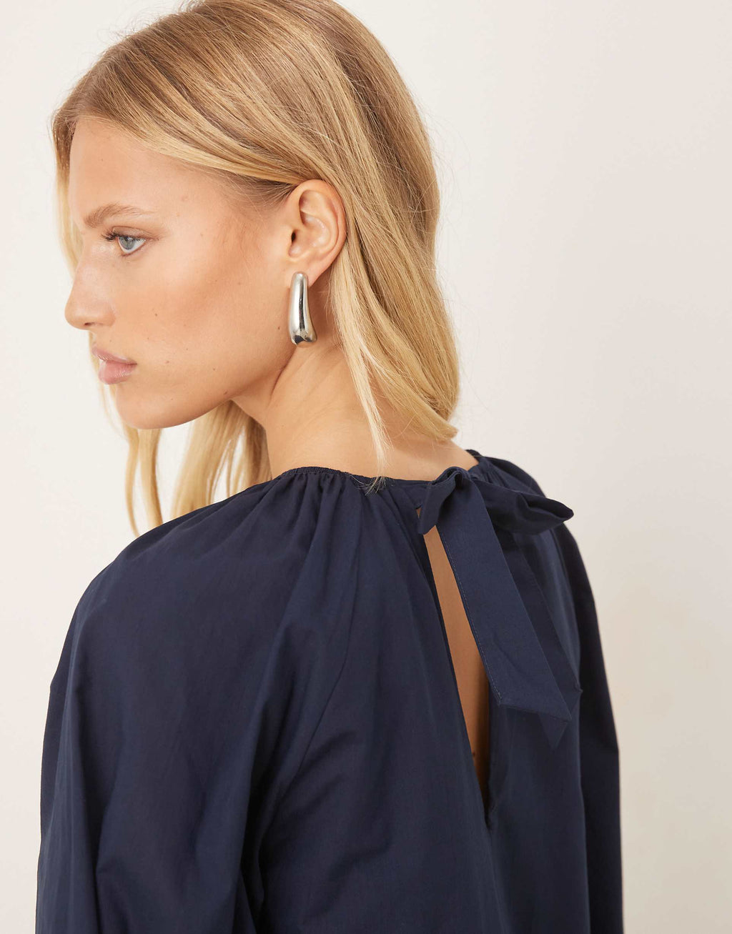 ASOS DESIGN volume smock mini dress with tie back detail in deep navy