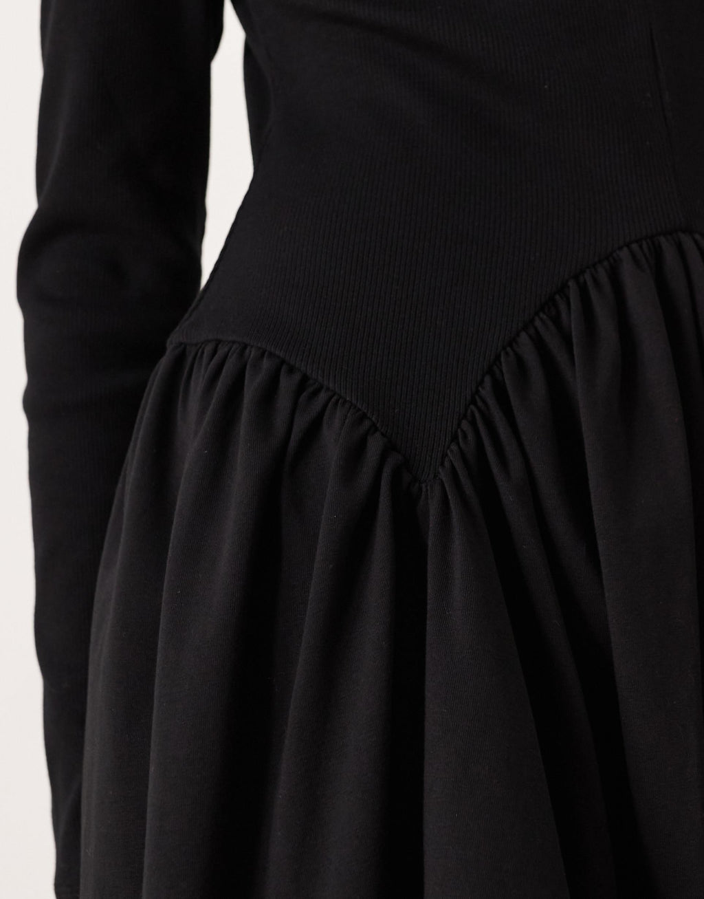 ASOS DESIGN long sleeve scoop dipped hem mini dress in black
