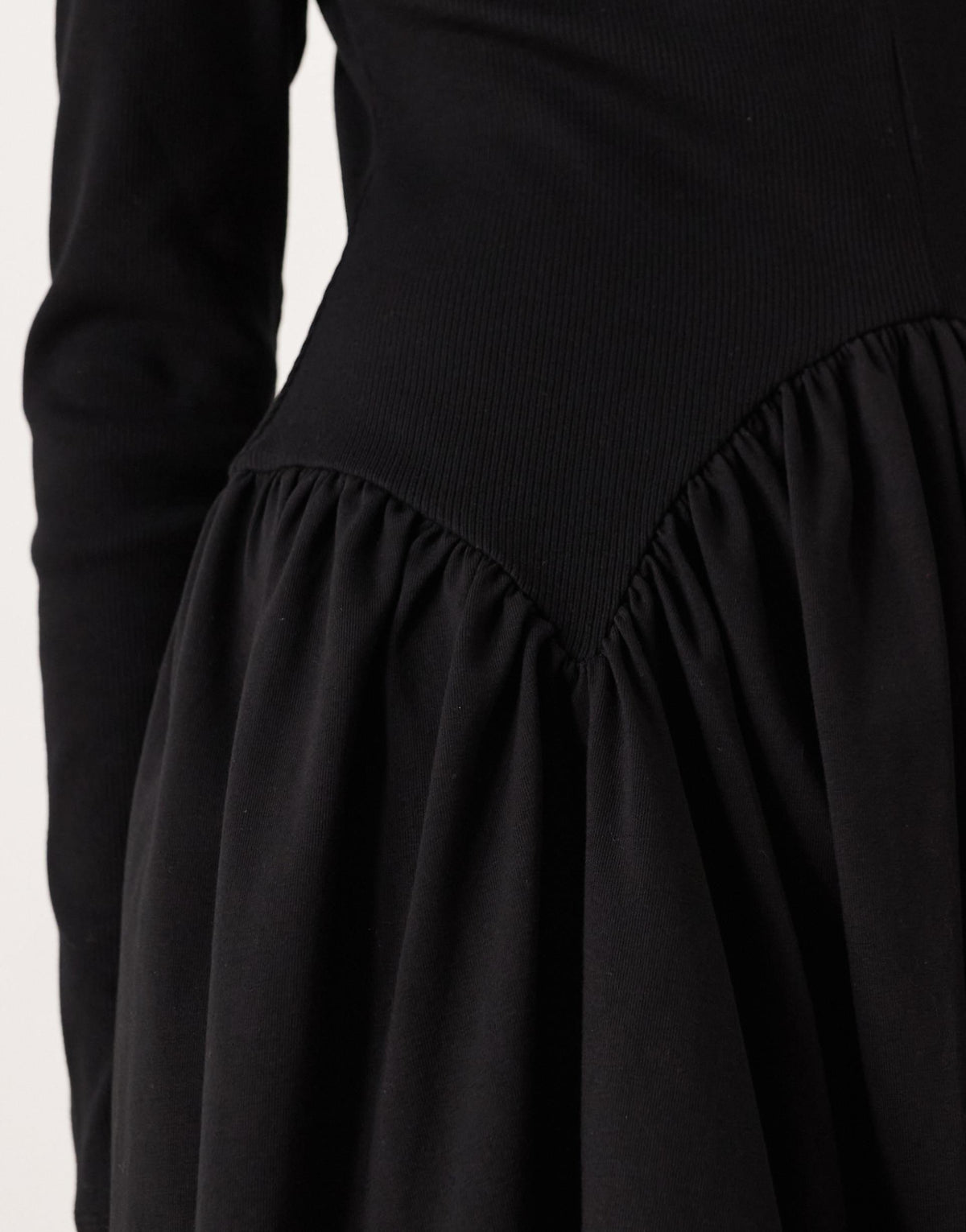 ASOS DESIGN long sleeve scoop dipped hem mini dress in black