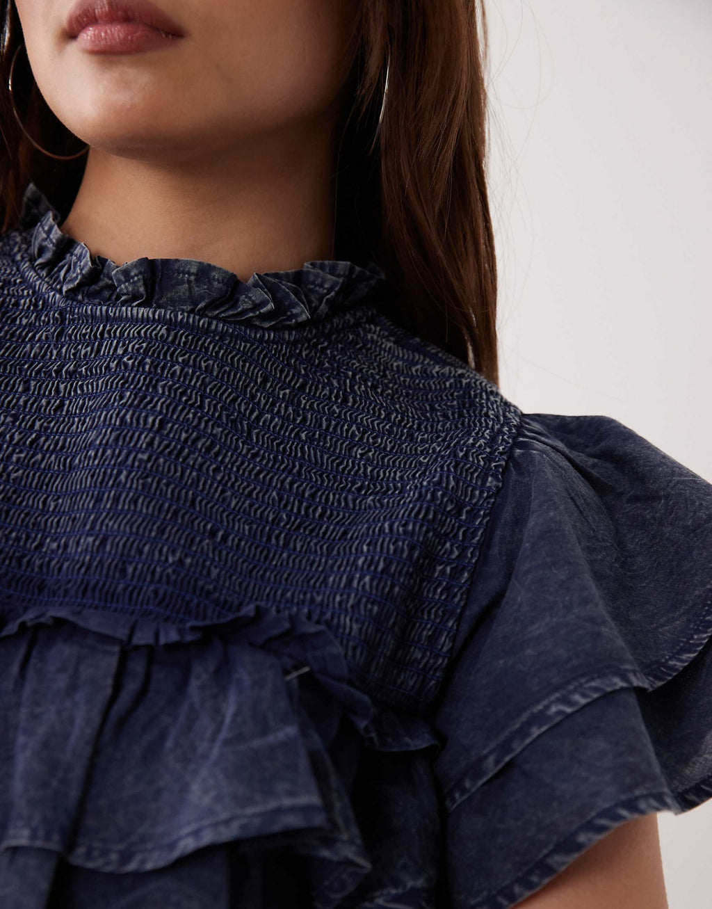 ASOS DESIGN Petite high neck ruffle mini dress with shirring in navy wash