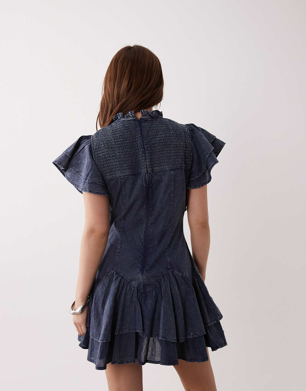 ASOS DESIGN Petite high neck ruffle mini dress with shirring in navy wash