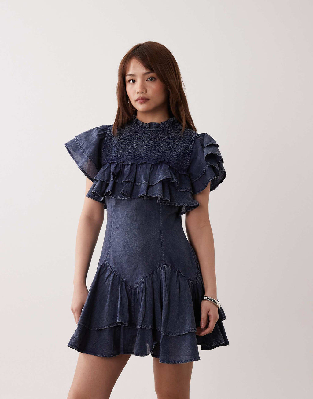ASOS DESIGN Petite high neck ruffle mini dress with shirring in navy wash