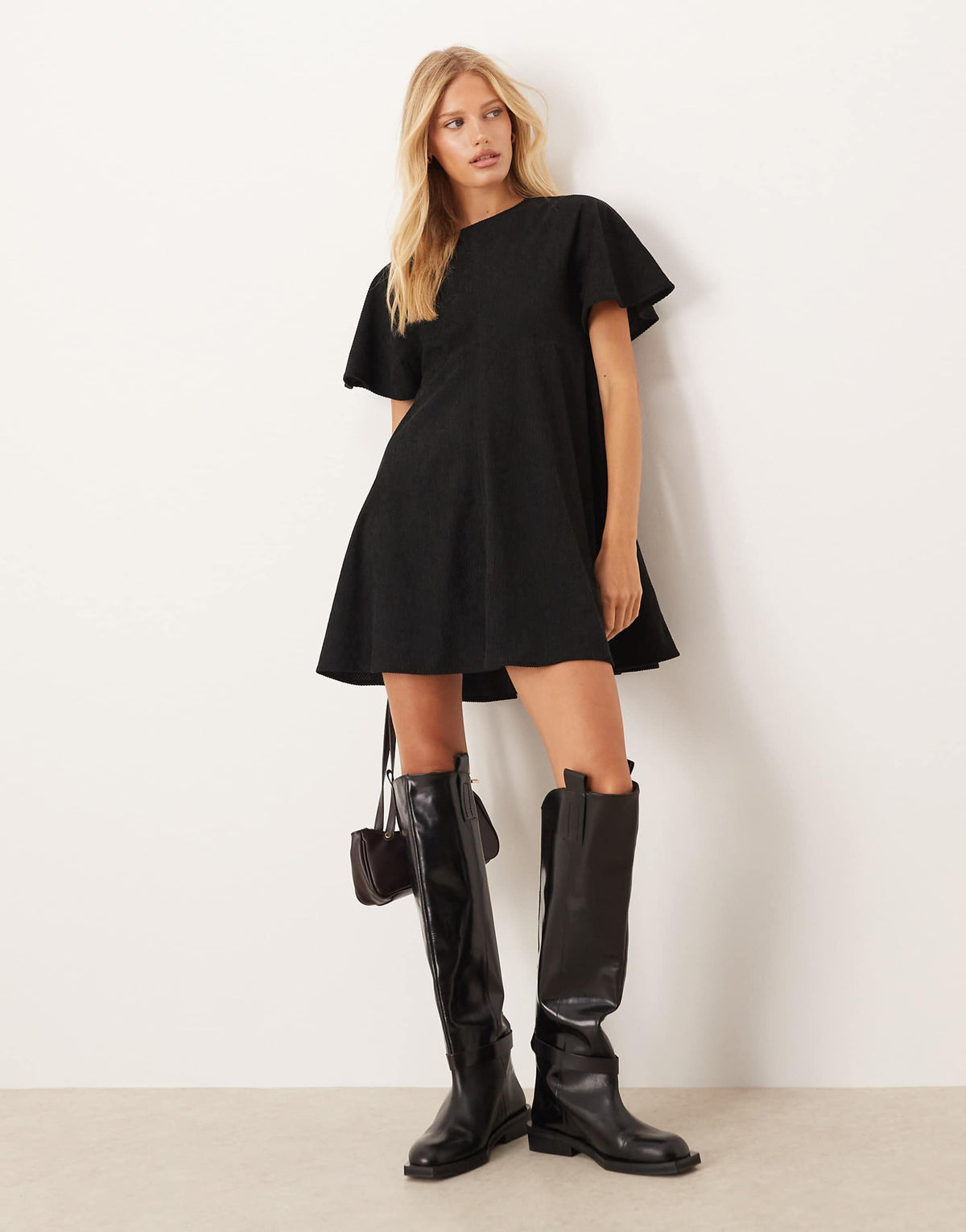ASOS DESIGN cord t-shirt mini dress with stitching detail in black
