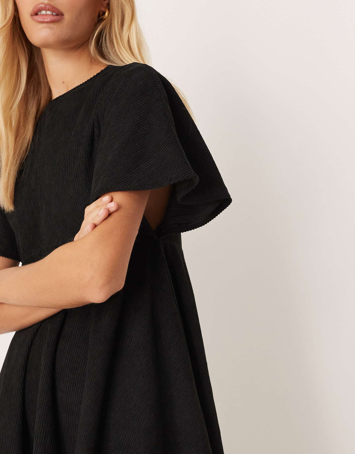 ASOS DESIGN cord t-shirt mini dress with stitching detail in black