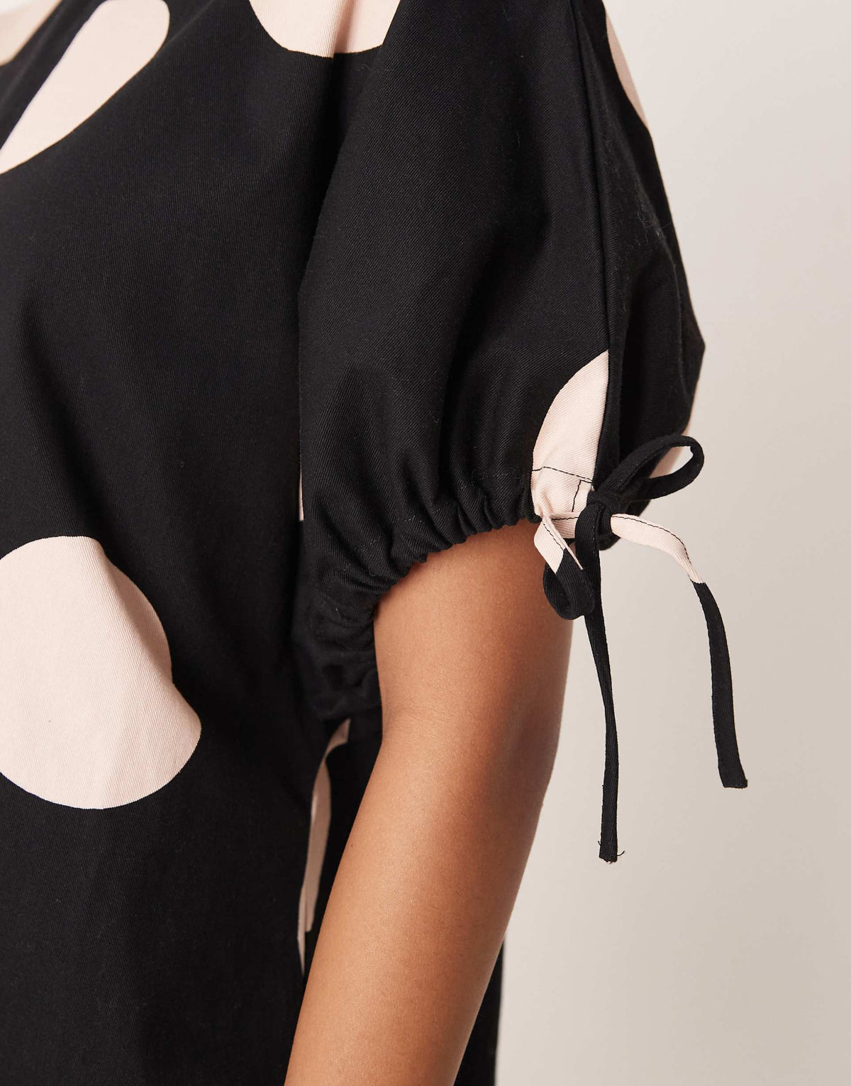 ASOS DESIGN crew neck mini dress with tie sleeve detail in polka dots
