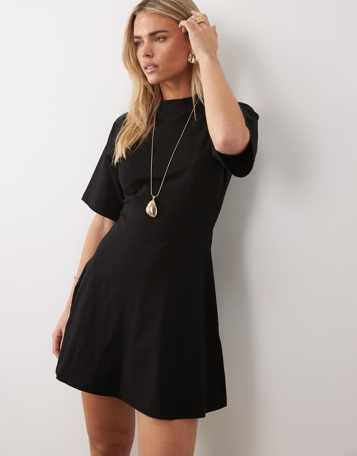 ASOS DESIGN Petite cinched seam detailing mini dress in black