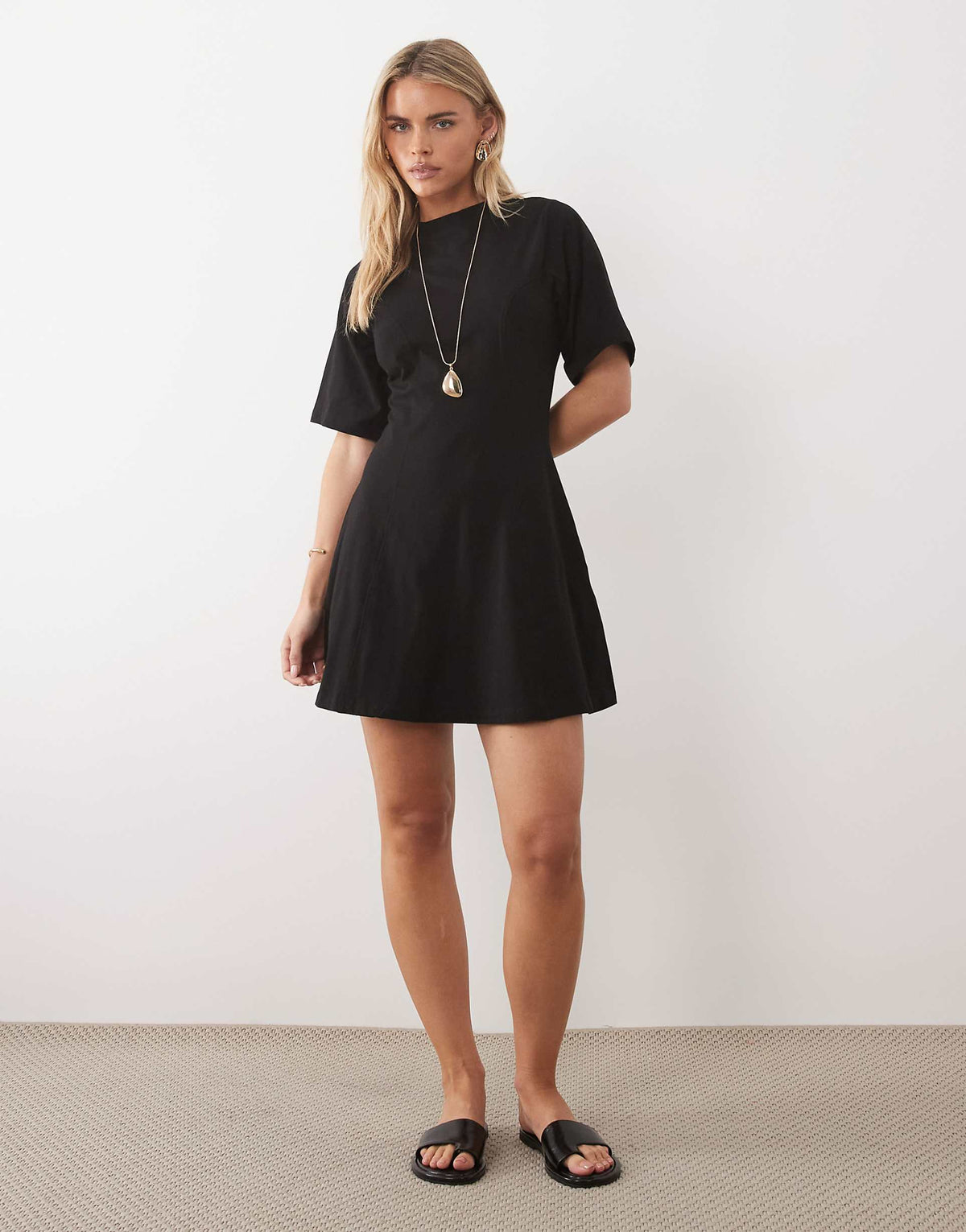 ASOS DESIGN Petite cinched seam detailing mini dress in black