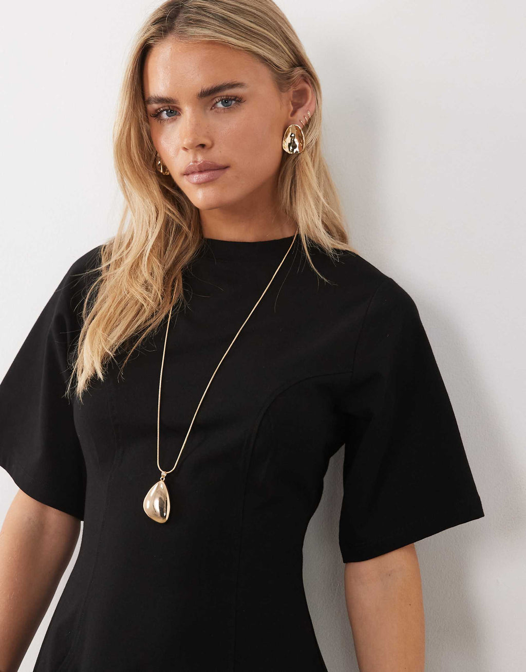 ASOS DESIGN Petite cinched seam detailing mini dress in black