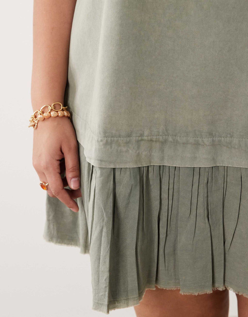 ASOS DESIGN Curve hybrid t-shirt mini dress in washed olive