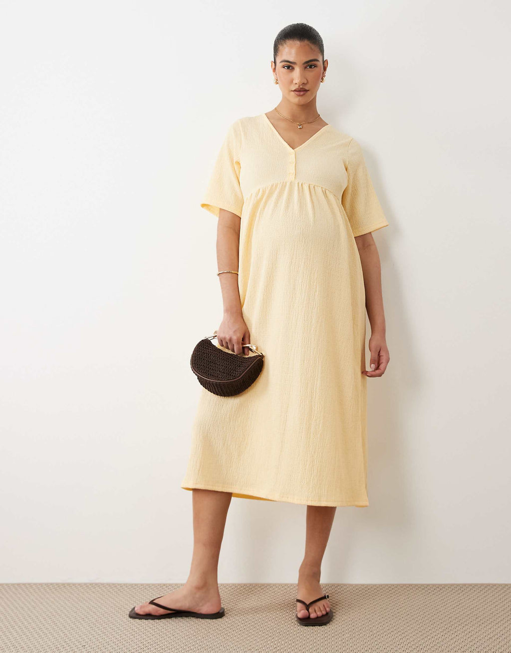 Mamalicious Maternity short sleeve nursing button detail textured jersey midi dress in yellow