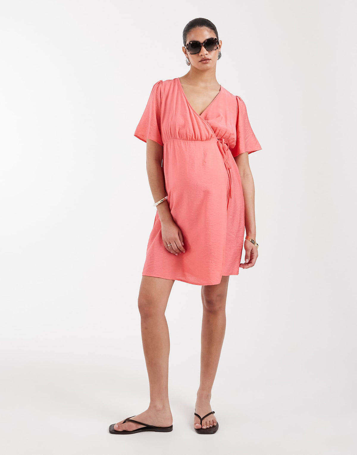 Vero Moda Maternity flutter sleeve wrap front mini dress in coral pink