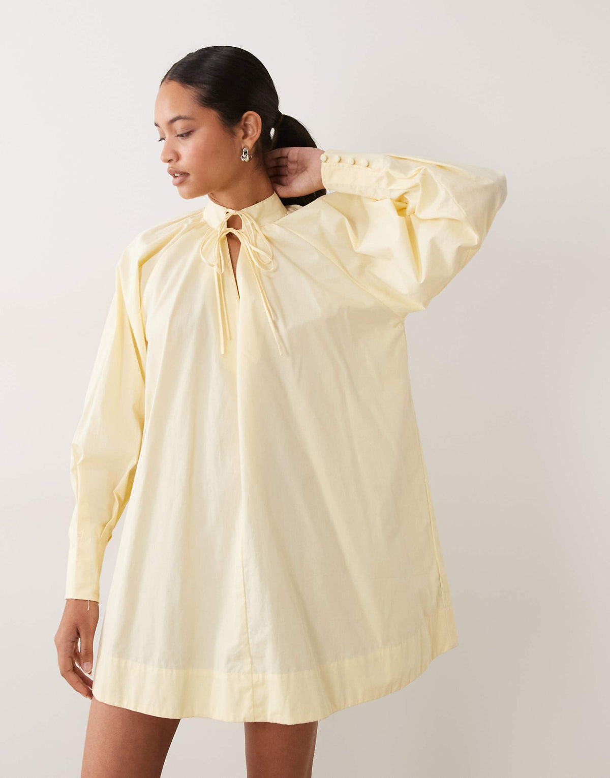 ASOS DESIGN high neck tie poplin mini dress with puff sleeve in tender yellow