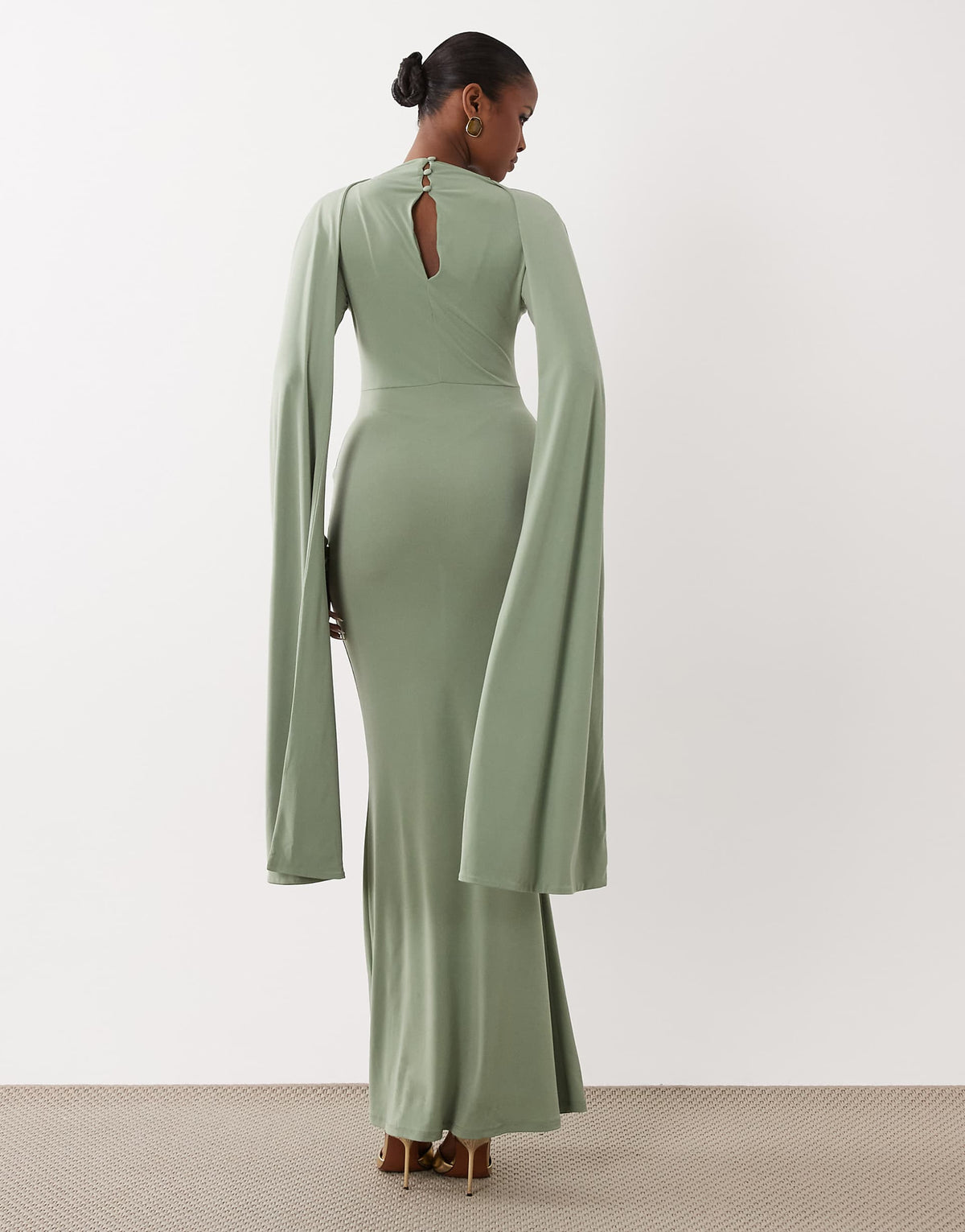ASOS DESIGN slinky long sleeve maxi dress with extreme cape shoulder detail in sage green