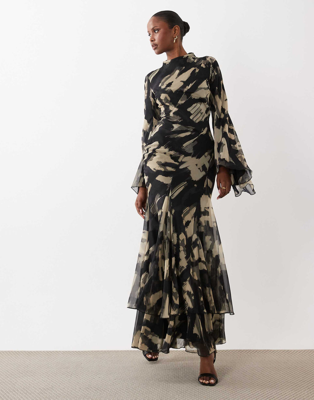 ASOS DESIGN long sleeve high neck maxi dress with ruffle godets and flute sleeves in mono abstract print