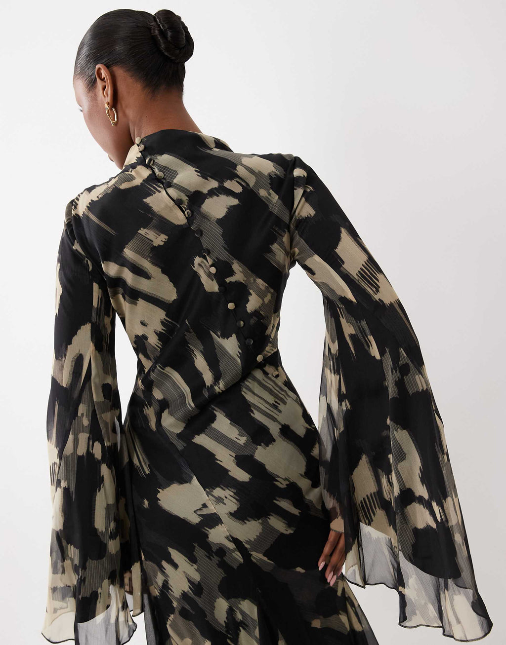 ASOS DESIGN long sleeve high neck maxi dress with ruffle godets and flute sleeves in mono abstract print