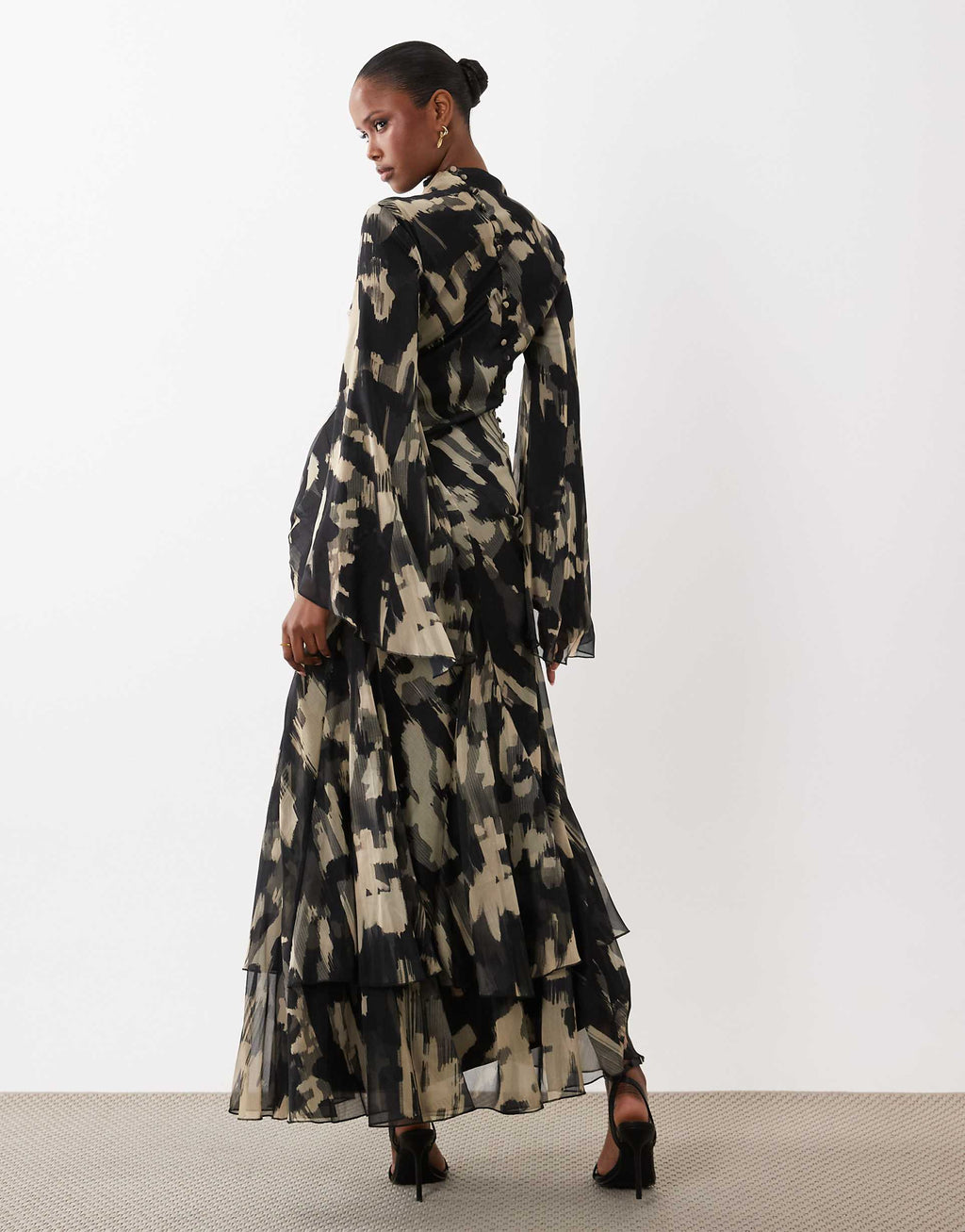 ASOS DESIGN long sleeve high neck maxi dress with ruffle godets and flute sleeves in mono abstract print