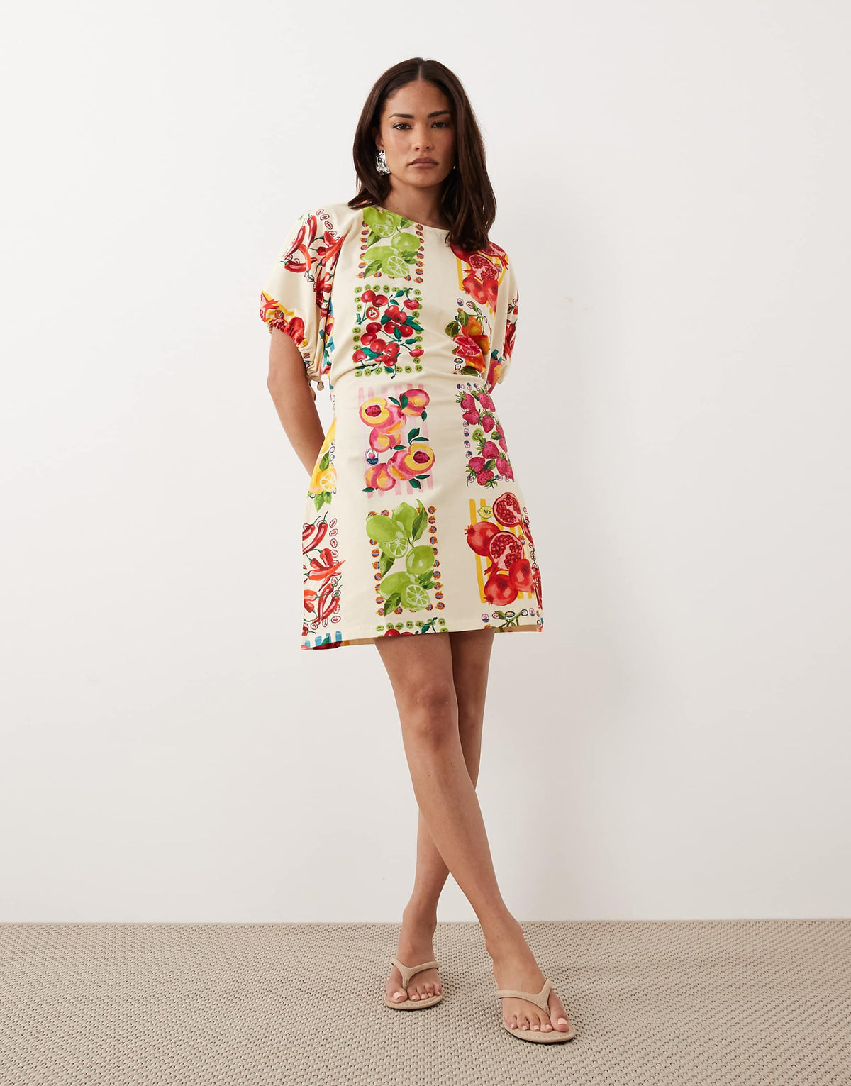 Never Fully Dressed Petite short sleeve tie back A-line mini dress in fruit print cream