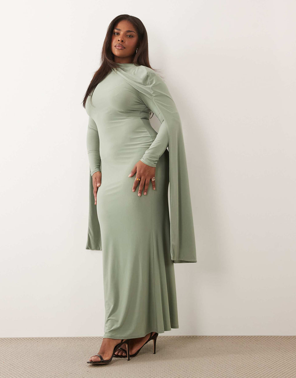 ASOS DESIGN Curve slinky long sleeve maxi dress with extreme cape shoulder detail in sage green