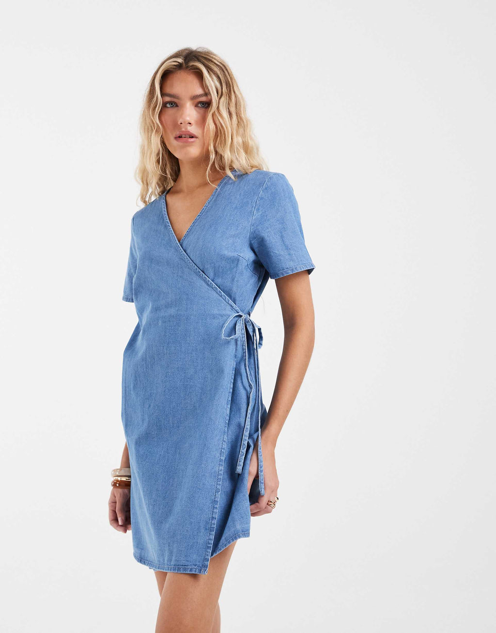 Vero Moda short sleeve wrap front denim mini dress in light blue wash