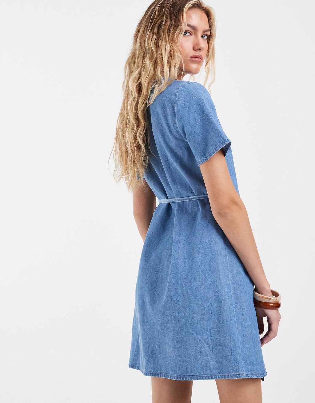 Vero Moda short sleeve wrap front denim mini dress in light blue wash