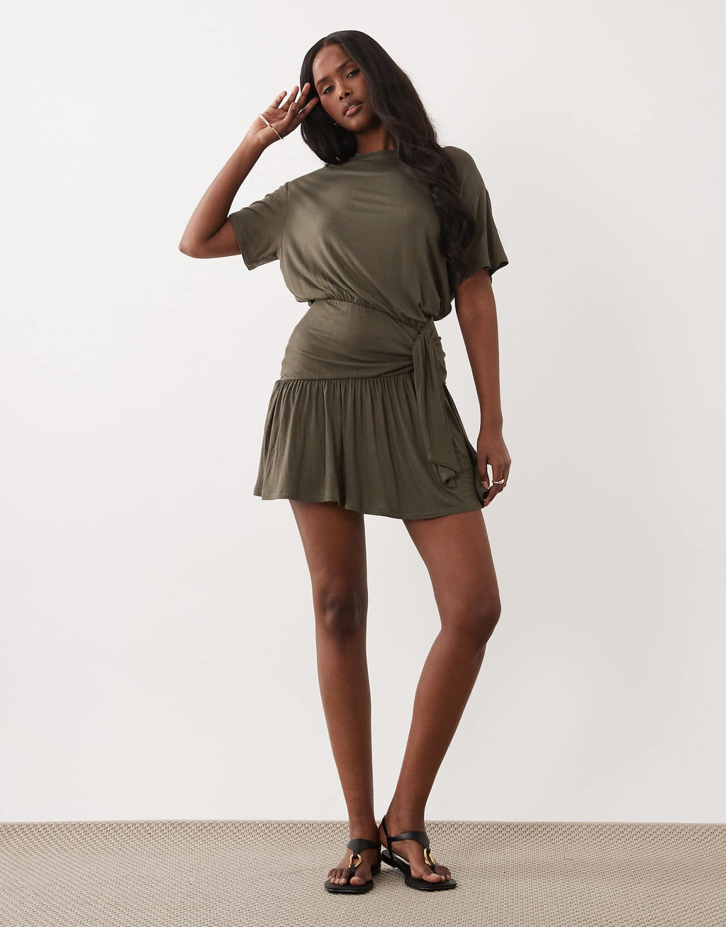 ASOS DESIGN peplum hem mini dress with tied knot detail in khaki green