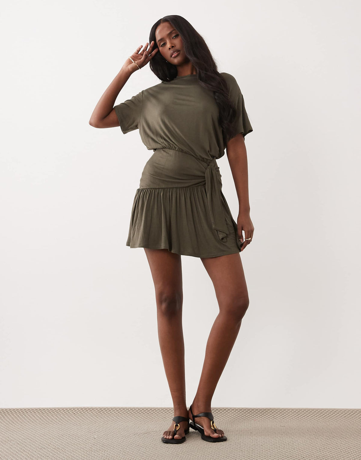 ASOS DESIGN peplum hem mini dress with tied knot detail in khaki green
